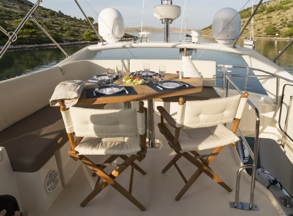 Breakfast table set on a yacht deck
