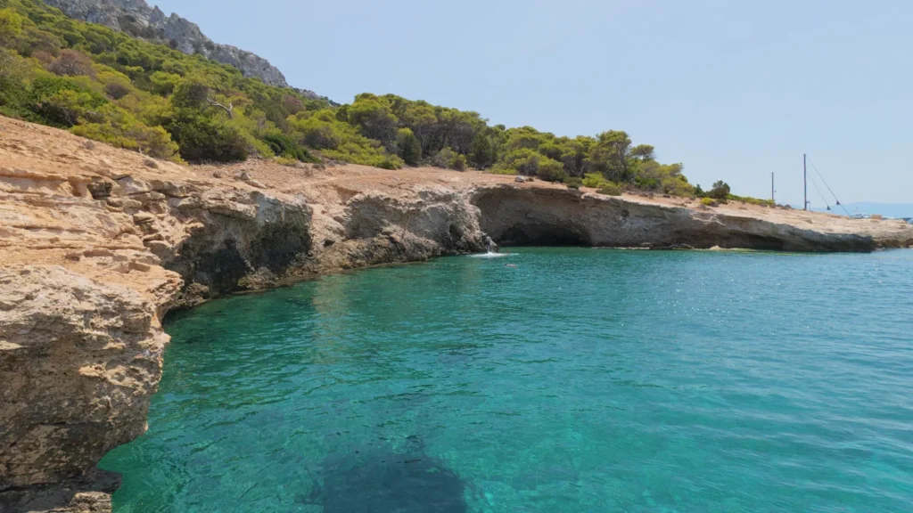 Rocky cove with turquoise water in the Saronic Gulf