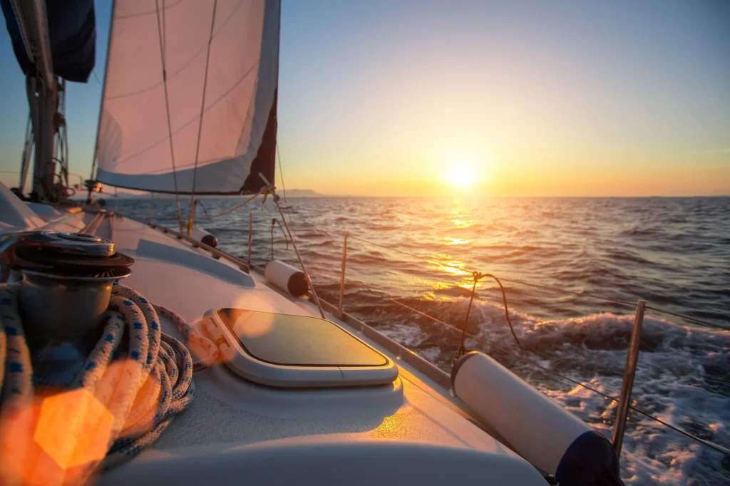 Sailing yacht heading into the sunset