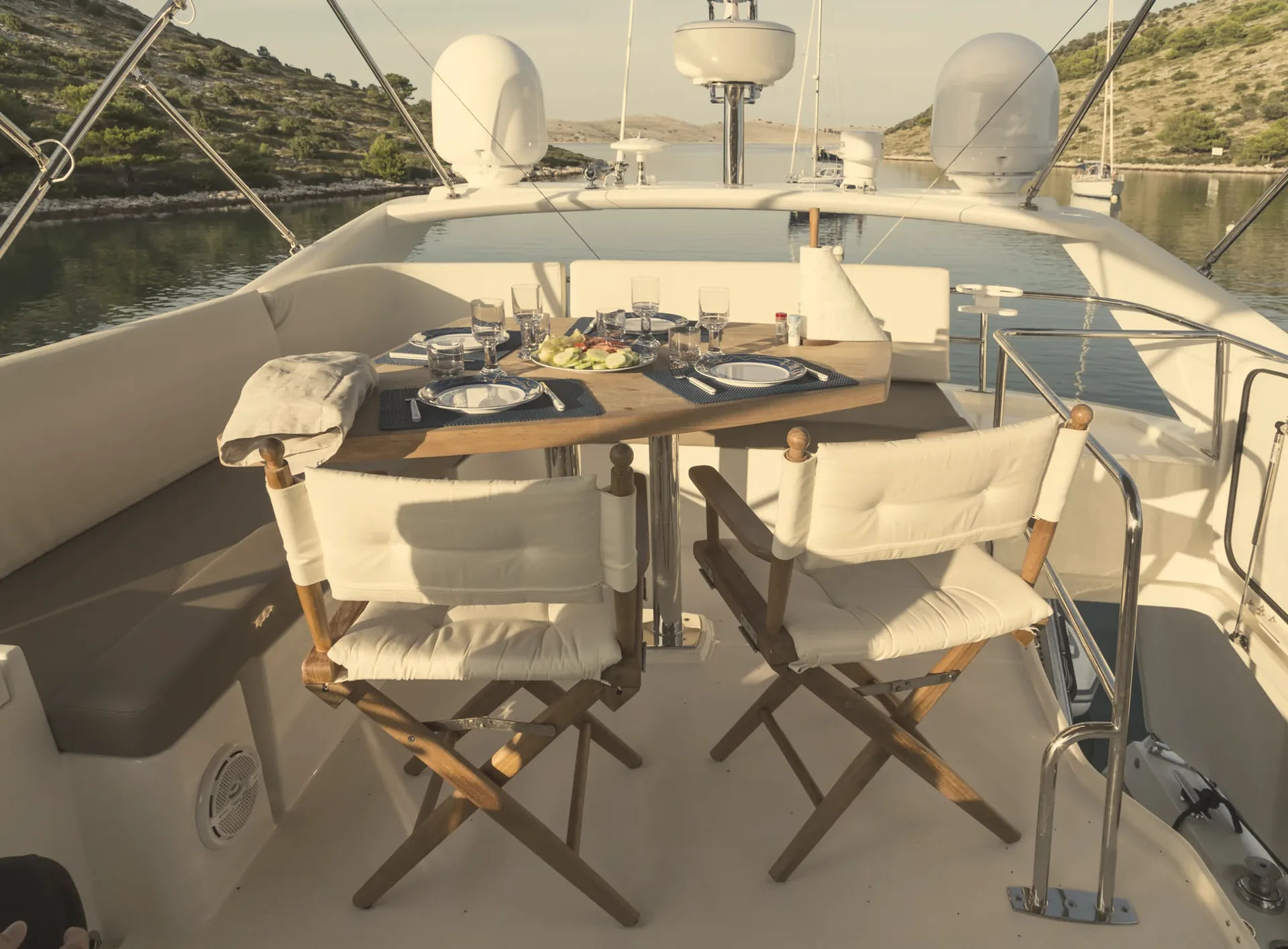 Breakfast table set on a yacht deck