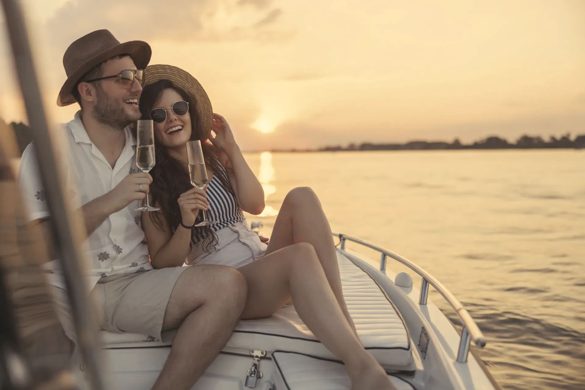 Couple enjoying the sunset on a yacht in Greece