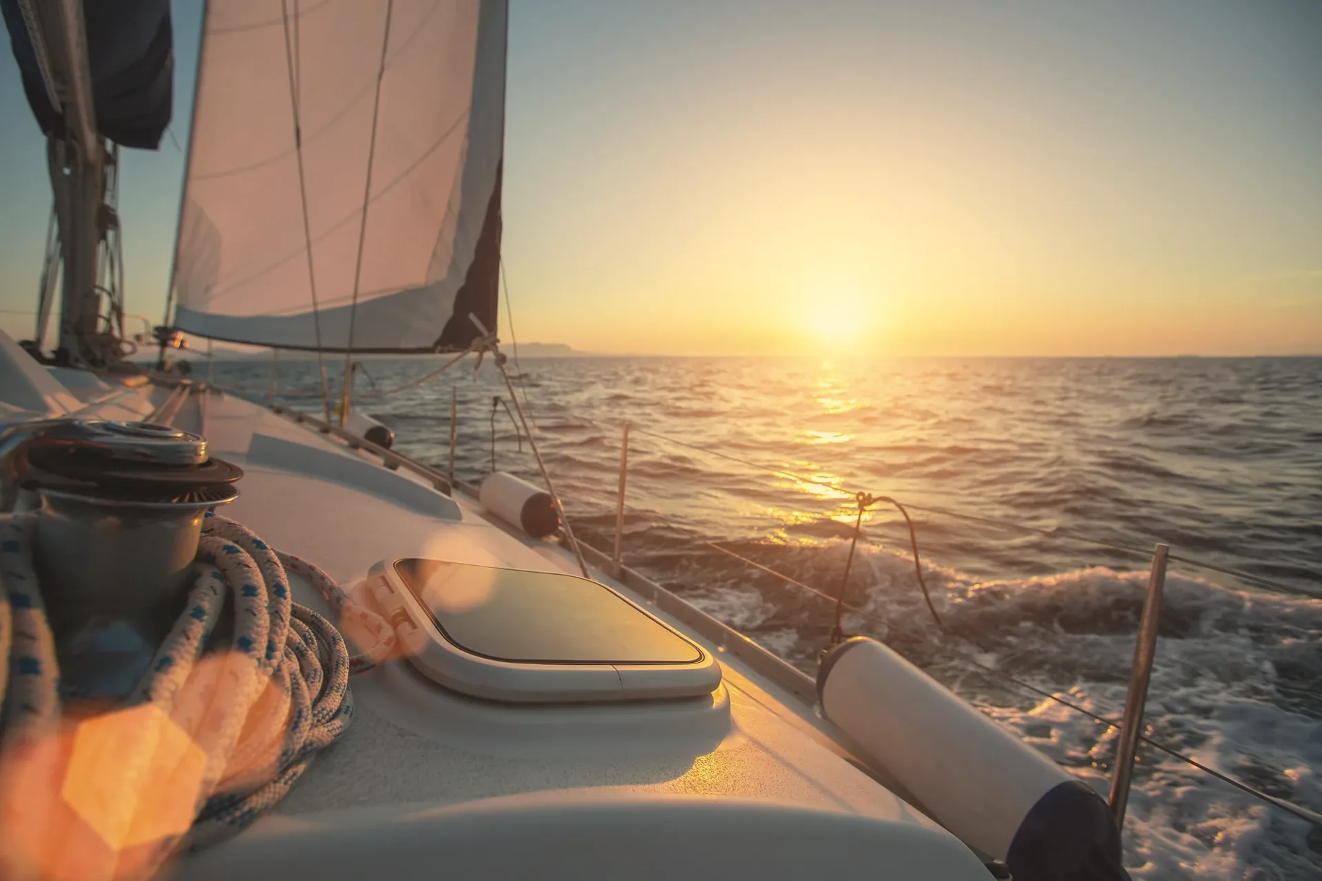 Sailing yacht heading into the sunset