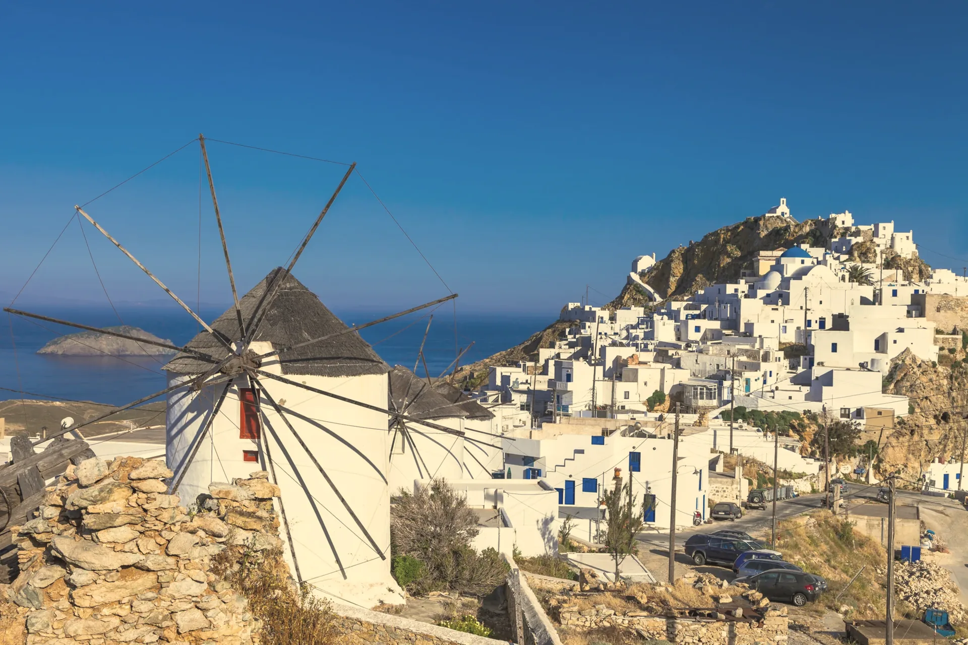 Windmill and white Chora of Serifos in the Cyclades