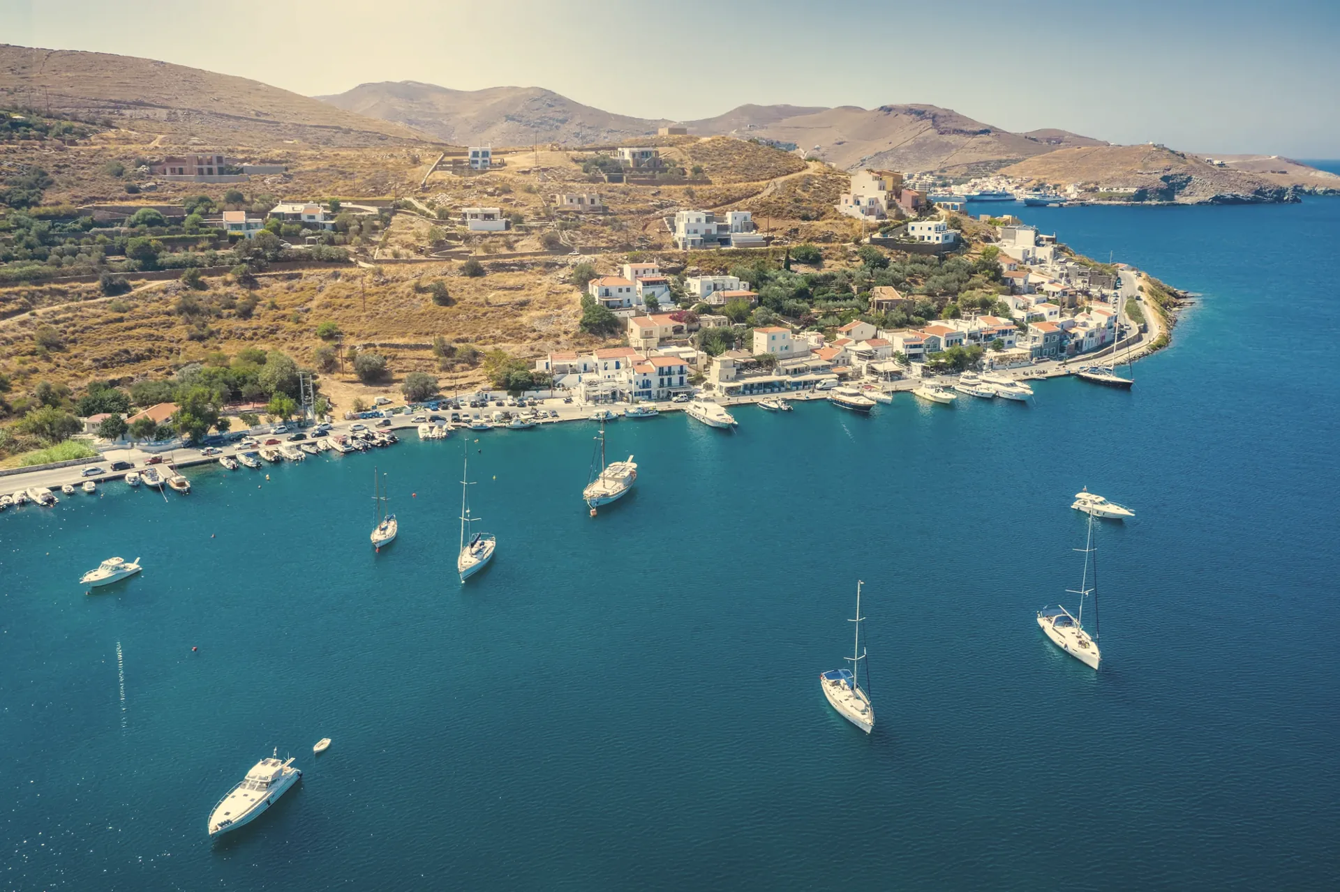 Vourkari harbour on Kea with anchored yachts